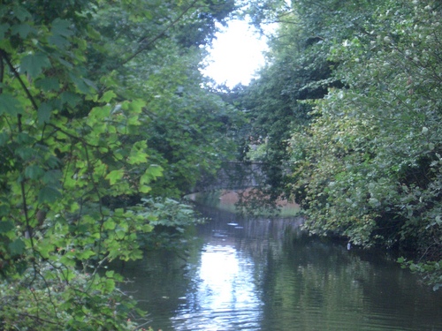 [Picture: River with arched stone bridge]