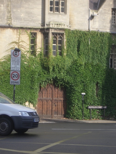 [Picture: Door through ivy-covered wall]