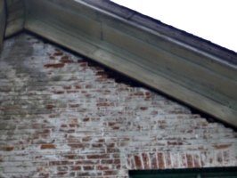 [picture: Brick damage at the eaves]