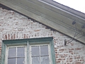 [Picture: Brick damage at the eaves: another view]