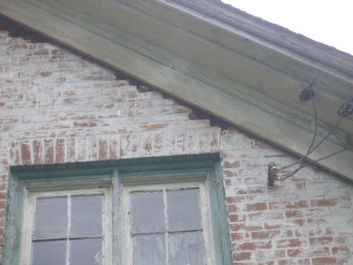 [Picture: Brick damage at the eaves: another view]