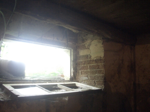 [Picture: basement window]