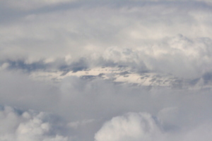 [picture: Snow-covered fields seen through clouds 3]