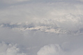 [Picture: Snow-covered fields seen through clouds 3]