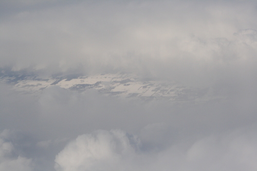 [Picture: Snow-covered fields seen through clouds 4]