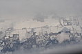 [Picture: Snow-covered fields seen through clouds 5]