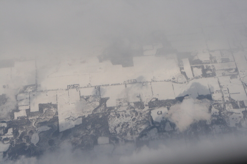 [Picture: Snow-covered fields seen through clouds 5]