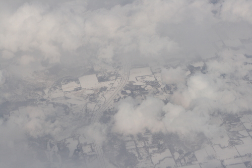 [Picture: Snow-covered fields seen through clouds 6]