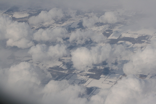 [Picture: Snow-covered fields seen through clouds 10]