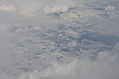 [Picture: Snow-covered fields seen through clouds 12]
