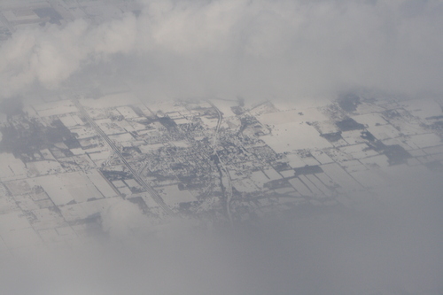 [Picture: Snow-covered fields seen through clouds 13]