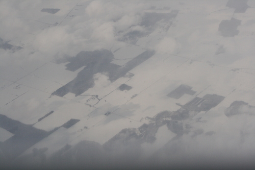 [Picture: Snow-covered fields seen through clouds 15]
