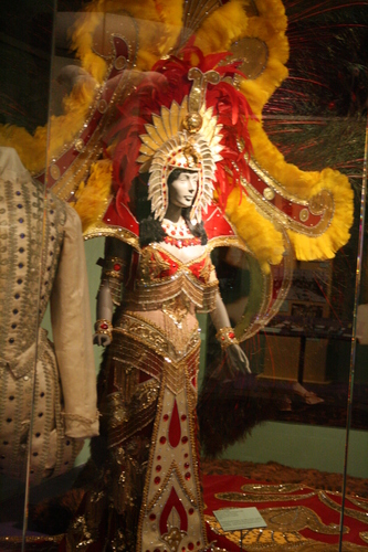 [Picture: Bright Orange mardi Gras Costume]