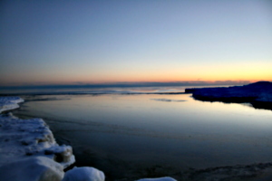 [picture: Sunset at the shore in winter]