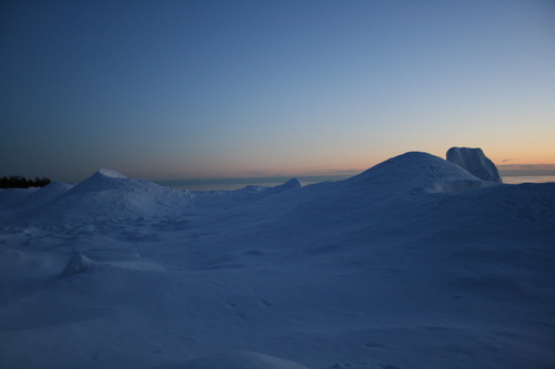 [Picture: Sculpted snow on the beach]