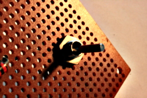 [picture: electronic toggle switch 2: side view in warm light]