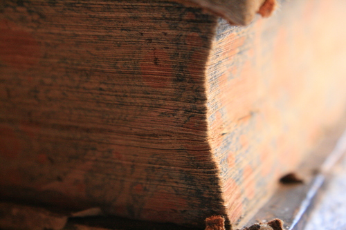 [Picture: Corner of a 1663 leather-bound book 2]
