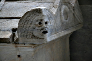 [picture: Theatrical mask from late Roman stone coffin 1]