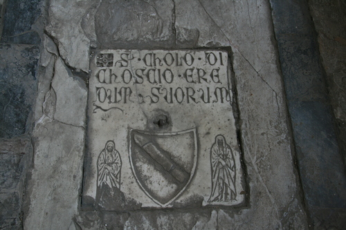 [Picture: Heraldic flagstone]