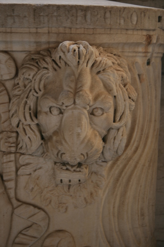 [Picture: Carved lion’s head]