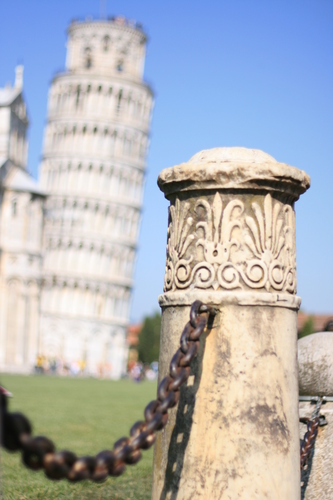 [Picture: Carved stone fence-post]