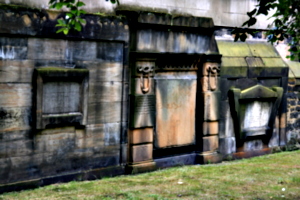 [picture: Wall with tombs]