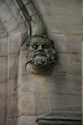 [Picture: Carved stone head 1]