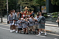 [Picture: Children carrying the mikoshi]