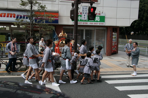 [Picture: Carrying the Mikoshi 1]