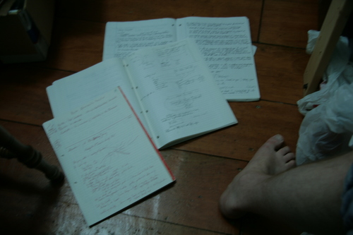 [Picture: Blurry notebooks]