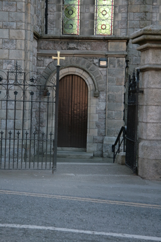 [Picture: Church gate and door]