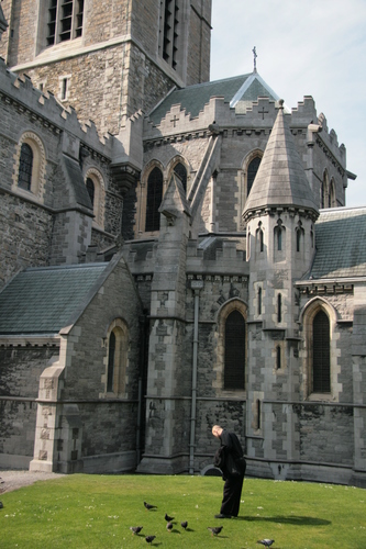 [Picture: Feeding the birds by the Church]