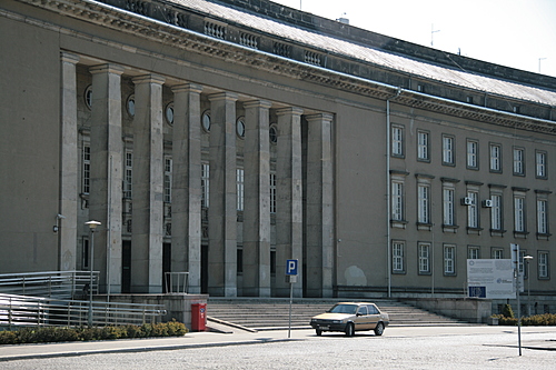 [Picture: Curved government building]